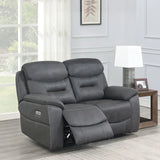 Dark grey leather 2-seater recliner sofa with power controls in modern living room