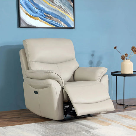 Light grey leather recliner chair with footrest extended beside a black round side table