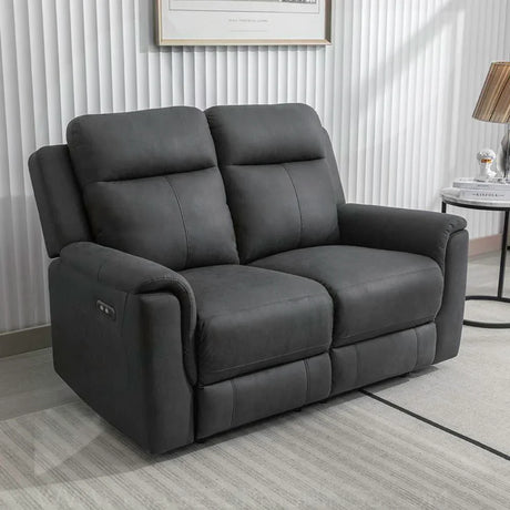 Gunmetal grey 2 seater recliner sofa with padded arms and electric controls in modern room