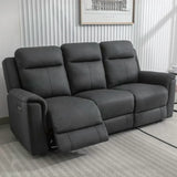 Gunmetal grey recliner sofa with padded seats and one footrest extended in living room