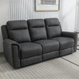 Gunmetal grey three seater recliner sofa with plush cushions in modern living room