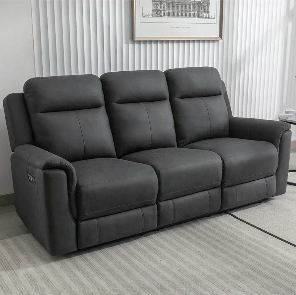 Gunmetal grey three seater recliner sofa with plush cushions in modern living room