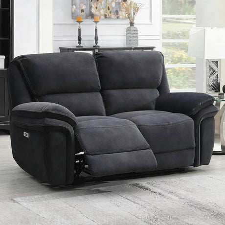 Two seater recliner sofa in dark fabric with footrest extended in modern living room