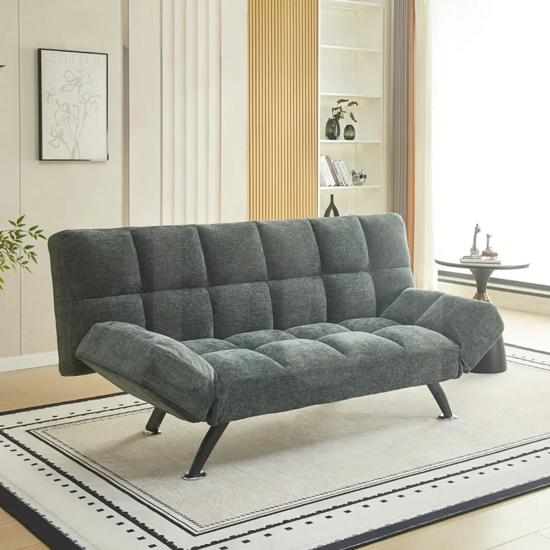 Winter moss fabric sofa bed with angled arms on cream rug in modern living room