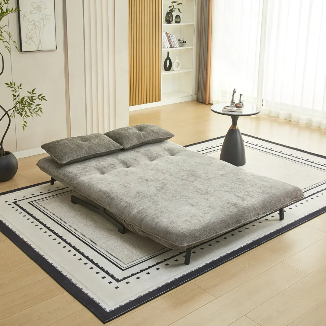 Tucker double sofa bed in liberty stone fabric folded out as a bed on patterned rug