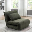 Corso sofa bed in winter moss fabric with cushion, shown in modern living room by window