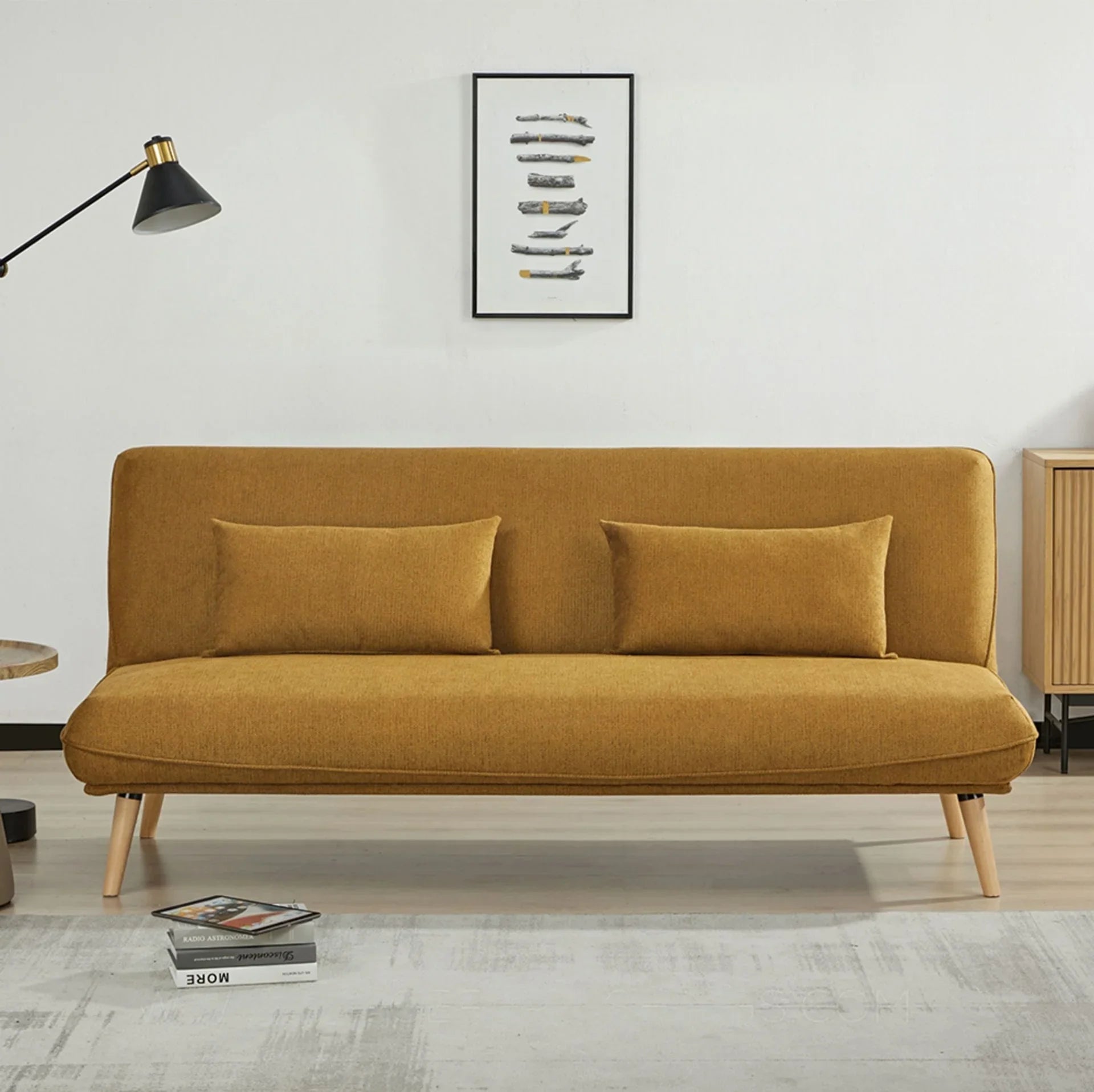 Pumpkin sofa bed with wooden legs and two cushions in modern living room