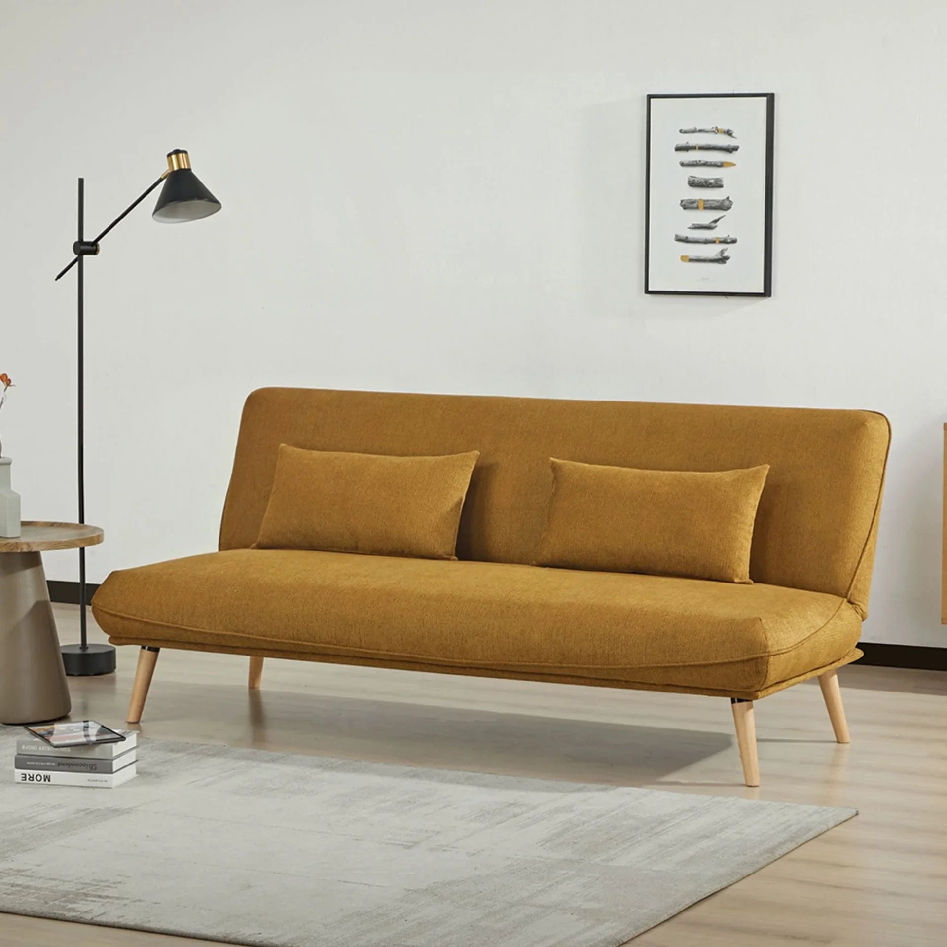 Pumpkin sofa bed with wooden legs and cushions in modern living room setting