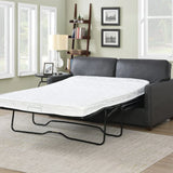 Grey sofa bed with mattress extended in modern living room setting
