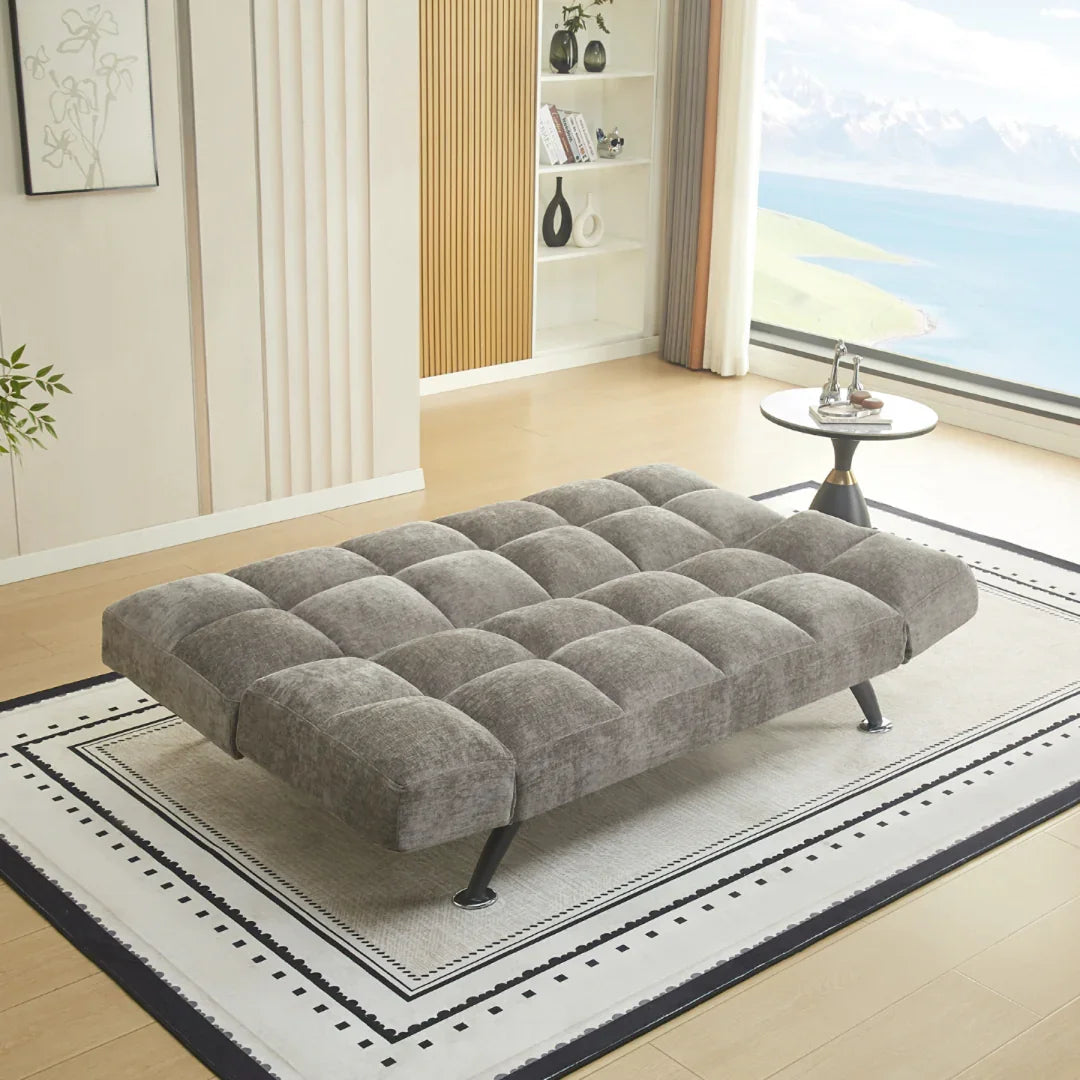 Boston sofa bed in Liberty Stone fabric, shown flat on patterned rug in modern living room