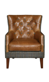 Brown leather accent chair with button-tufted back and tweed fabric base, front view