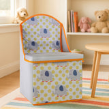 Colorful children's storage seat featuring an elephant design with a blue and yellow polka dot pattern. The seat has a soft, padded backrest and a hinged lid for storage, set against a light-colored room with a plush rug and teddy bears in the background