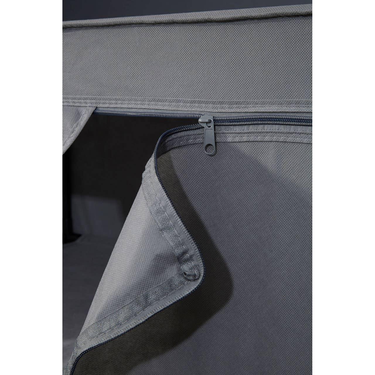 Close-up of fabric furniture cover with zip opening detail