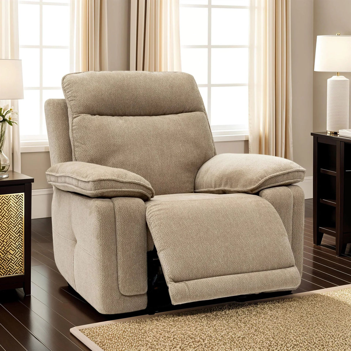 Beige fabric recliner armchair with footrest extended, in a living room setting