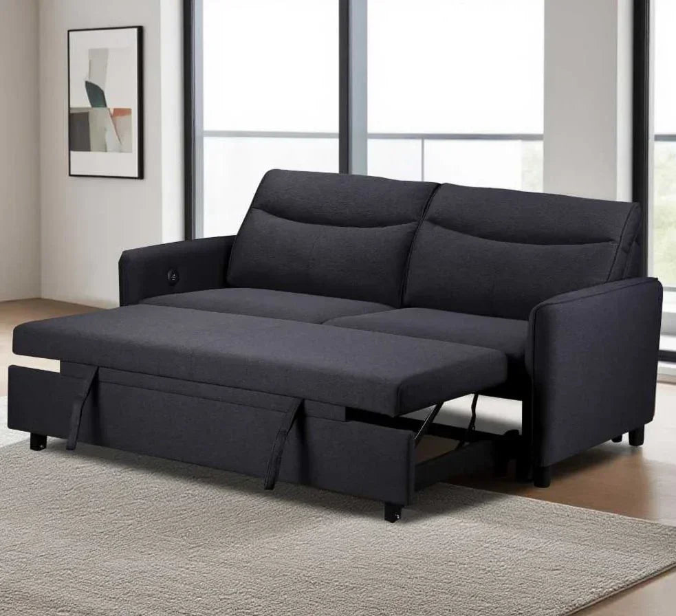 Dark grey fabric sofa bed extended in a modern living room with large windows