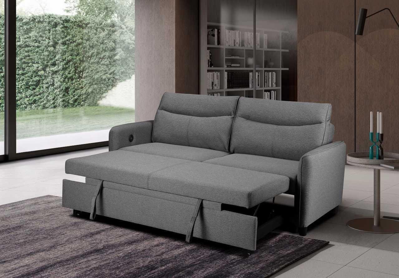 Grey fabric sofa bed with pull-out mattress in modern living room