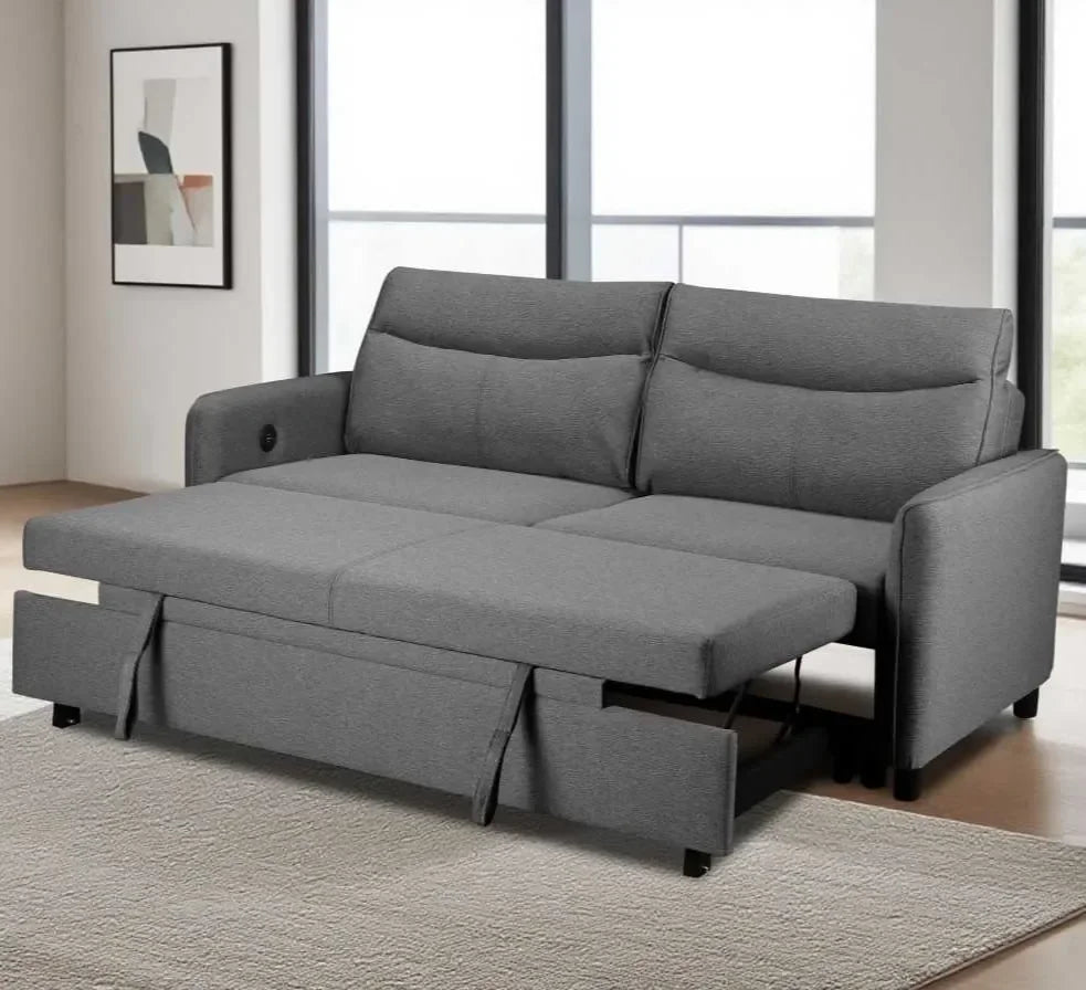 Grey fabric sofa bed with pull-out mattress and armrests in a modern living room