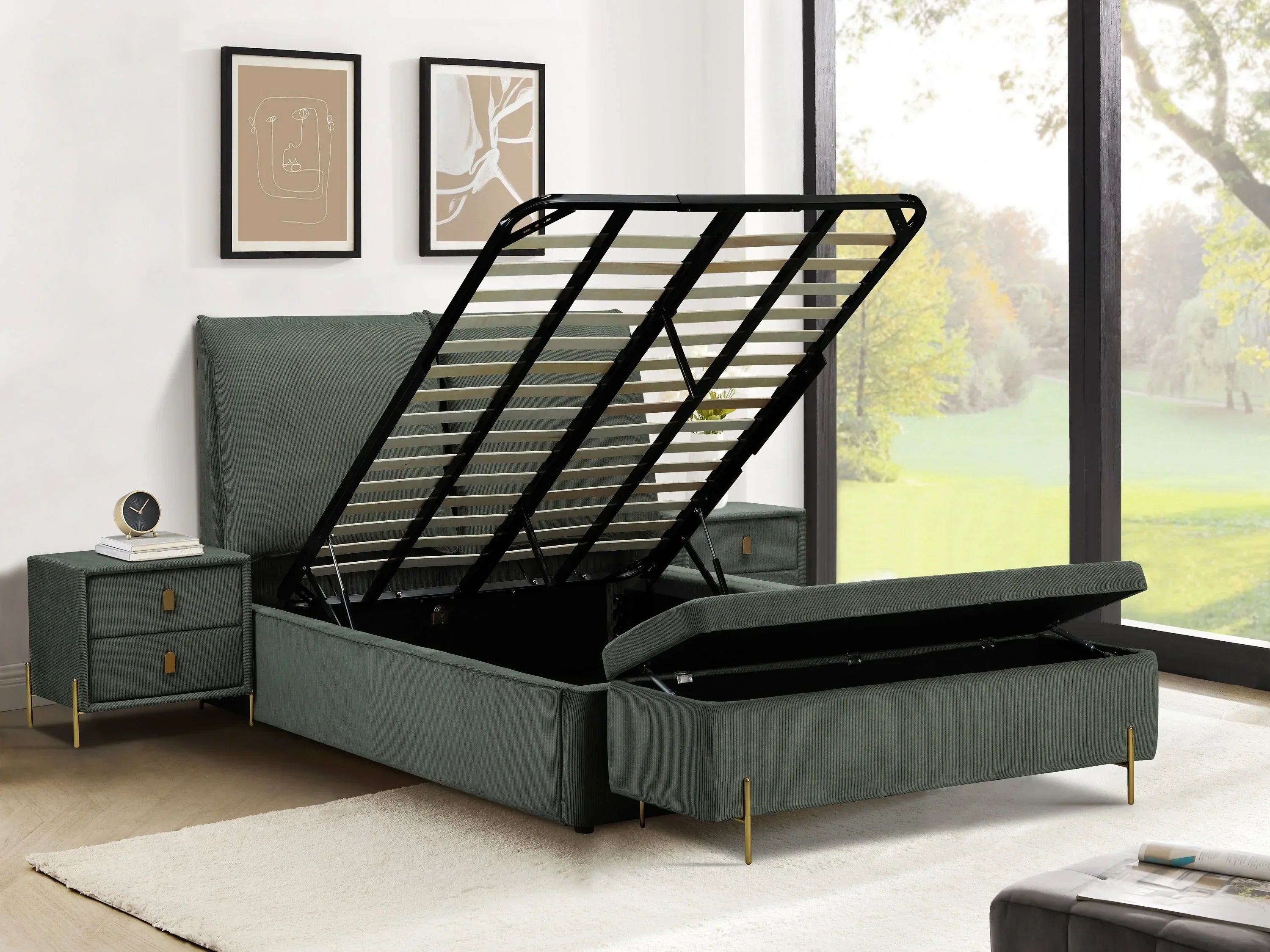 Green upholstered ottoman storage bed with raised slatted frame beside matching bedside table
