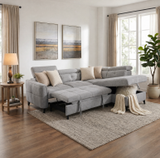 Grey corner sofa with plush cushions in a cozy living room setting with natural light