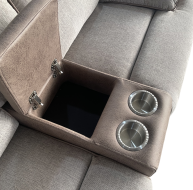 Two-tone fabric sofa with a storage compartment and cup holders for added convenience
