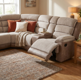 Jessica Corner Sofa in a cozy living room setting with throw pillows and a blanket