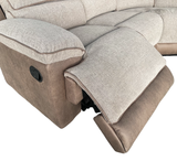 Reclining corner sofa with plush cushions and a stylish two-tone fabric design