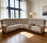 L-shaped corner sofa in a cozy living room with large windows and soft lighting