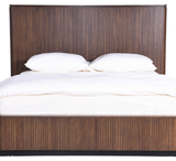 Cleo Bed with a ribbed wooden headboard and soft white bedding for a cozy bedroom aesthetic