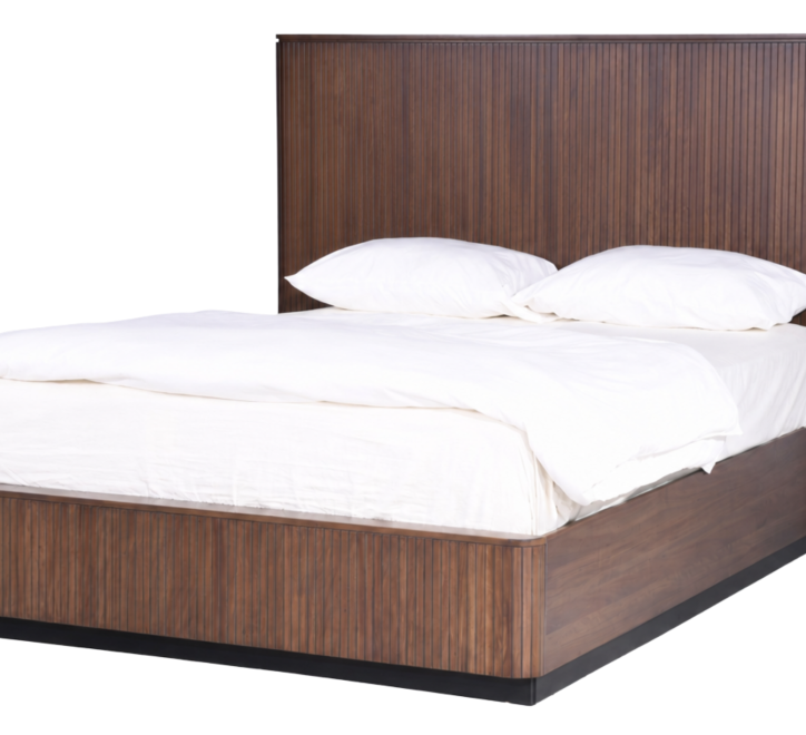 Cleo Bed featuring a stylish wooden headboard and soft white bedding for a cozy bedroom aesthetic