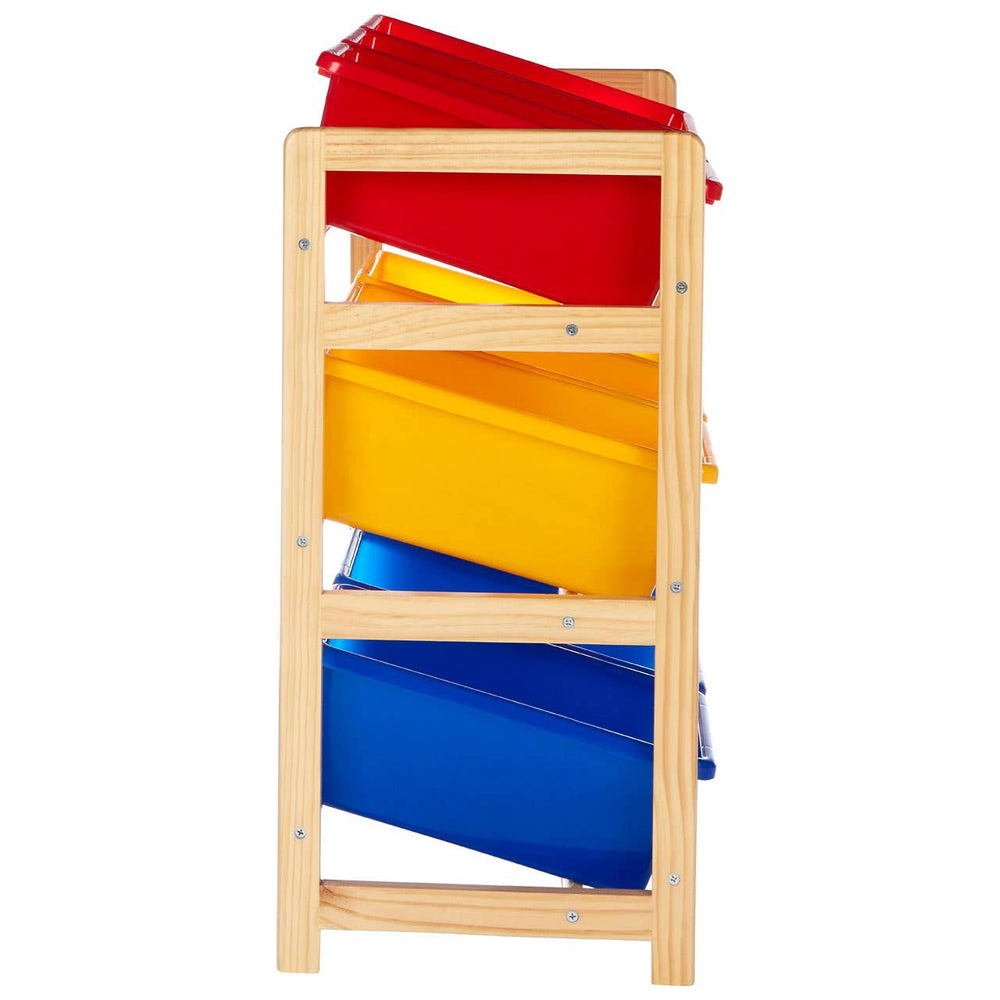Three-tier storage unit made of pine wood featuring a natural finish, with colorful fabric bins in red, yellow, and blue arranged from top to bottom. The bins are designed for easy access and organization, ideal for children's toys or books