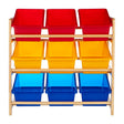 Three-tier storage unit made of pine wood featuring colorful bins. The top row has two red bins, the middle row has two yellow bins, and the bottom row has two blue bins. The unit has a natural wood frame and is designed for children's storage