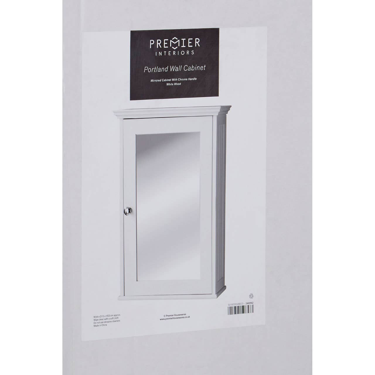 A sleek white cabinet featuring a mirrored front door, with a simple rectangular design and a small round handle. The cabinet is mounted on a light-colored wall, showcasing its modern aesthetic