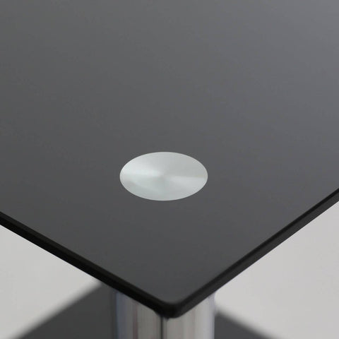 Black glass end table featuring a sleek two-tier design with a circular silver accent on the top surface. The table has a modern aesthetic, suitable for contemporary home decor