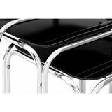 Black nesting tables with chrome metal frame close-up