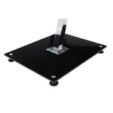 A sleek black tempered glass end table with a chrome frame, featuring a square top and rounded corners. The table has a central support with a chrome base and four small rubber feet for stability. The overall design is modern and minimalist, suitable for various home decor styles
