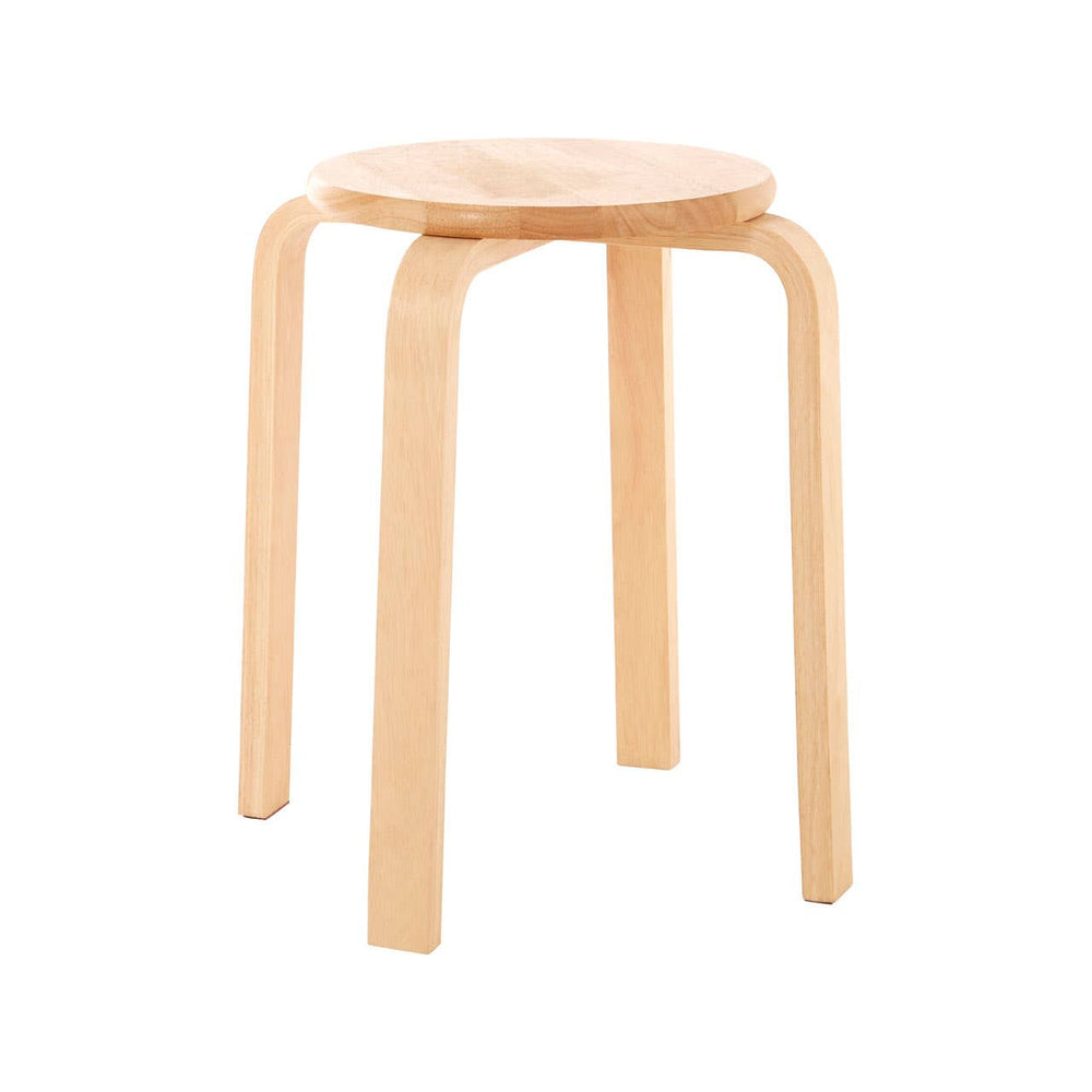 Round stool made from tropical Hevea wood with a natural finish, featuring four curved legs and a smooth, circular seat. The design is minimalist and stackable for easy storage
