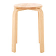 Round stool made from tropical Hevea wood with a natural finish, featuring four sturdy legs and a smooth, circular seat. The design is simple and minimalist, allowing for easy stacking and storage
