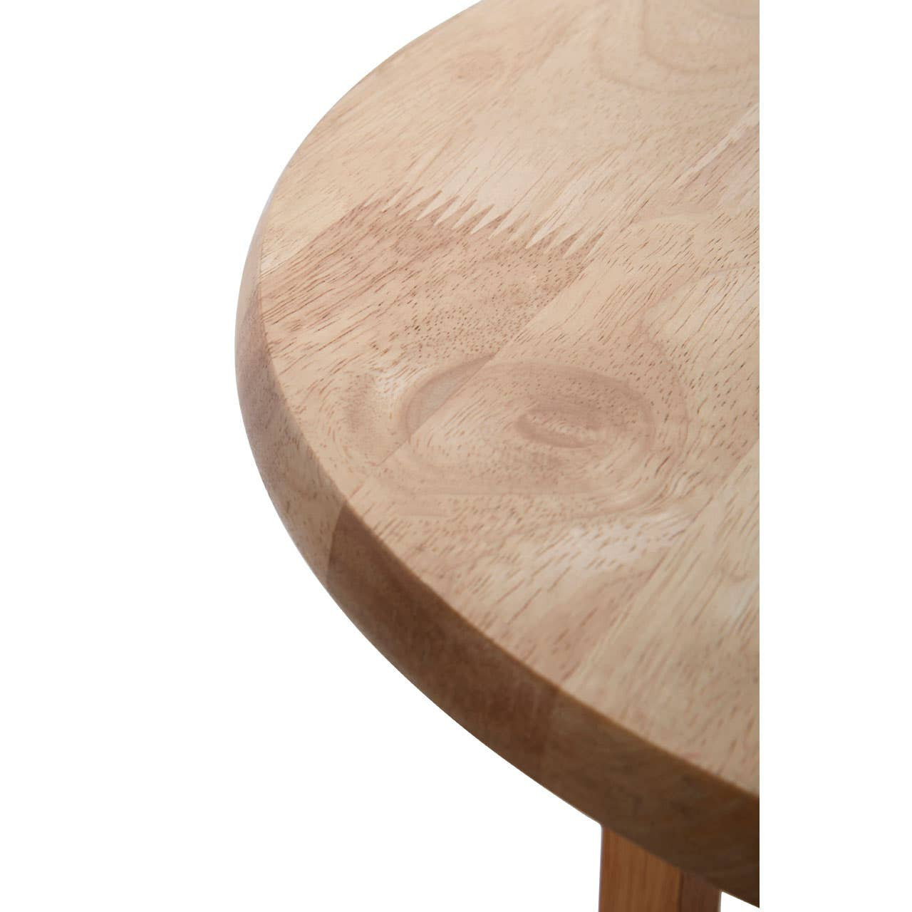 Round side table made from tropical Hevea wood, featuring a smooth, light-colored wooden surface with natural grain patterns and a simple, sturdy design. The table has four tapered legs that provide stability