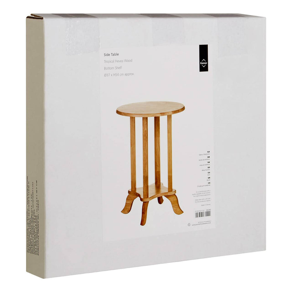 Round side table made from tropical Hevea wood, featuring a smooth top and four sturdy legs, packaged in a white box with a clear front displaying the product