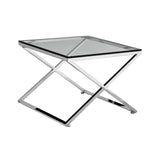 Modern glass side table with chrome metal frame and geometric crossed leg design