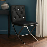 Black leather dining chair with chrome legs and button-tufted backrest