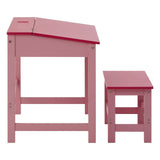 A pink children's desk with a slanted top and a matching stool, both featuring a simple design and sturdy legs. The desk includes a small storage compartment on the top surface
