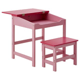 A pink children's desk with a hinged top and a matching pink stool, both featuring a simple, modern design. The desk has a small storage compartment underneath the top, and the stool is designed to fit comfortably beneath the desk