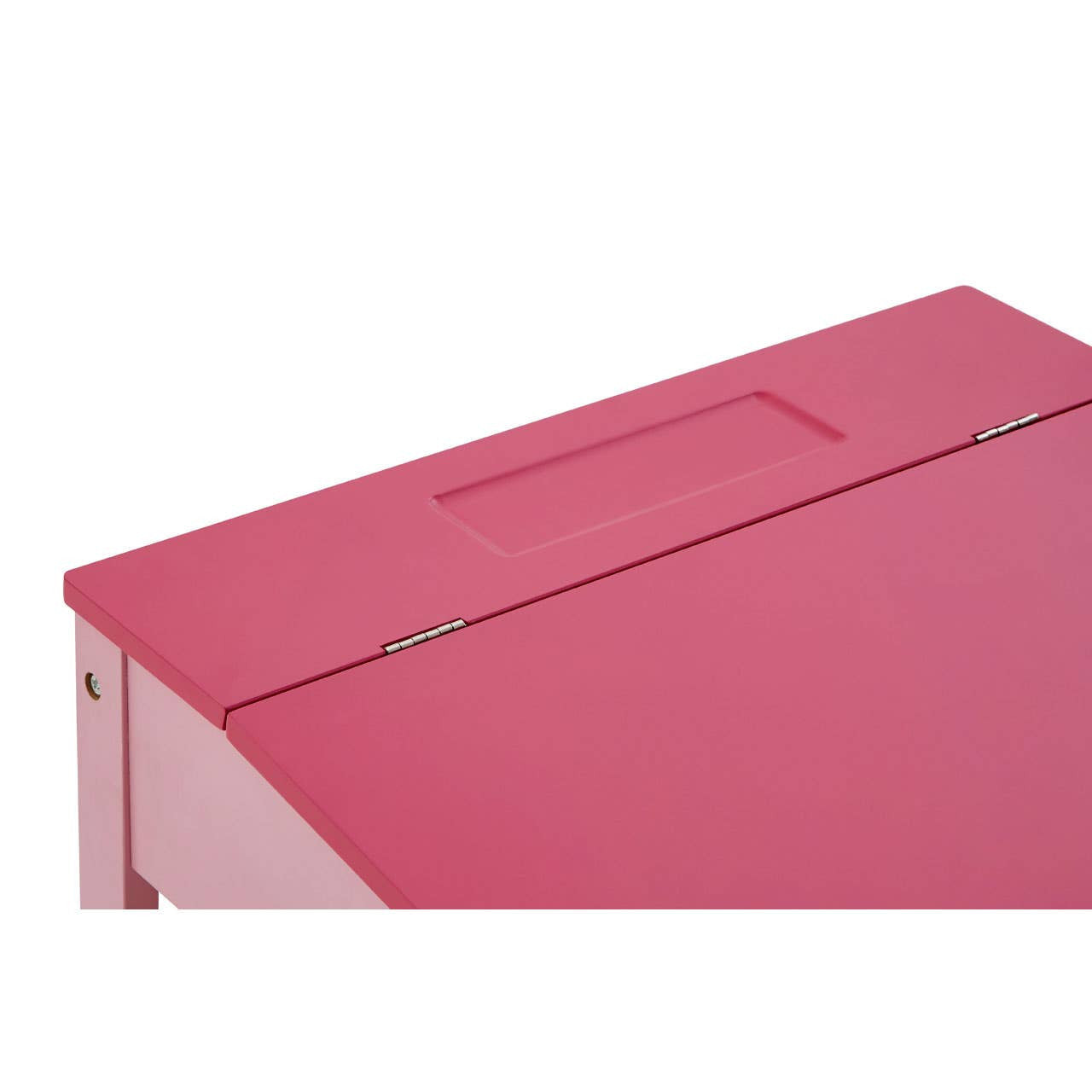 A close-up view of a pink desk with a smooth surface and a small cutout handle on the top, showcasing its vibrant color and simple design
