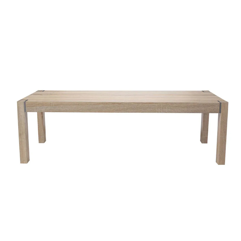 Rectangular oak dining table with metal corner accents, straight legs, front view