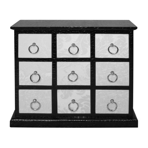 Rectangular cabinet featuring nine drawers with a crocodile leather effect, black frame, and silver circular drawer pulls. The cabinet has a sleek design suitable for home furniture