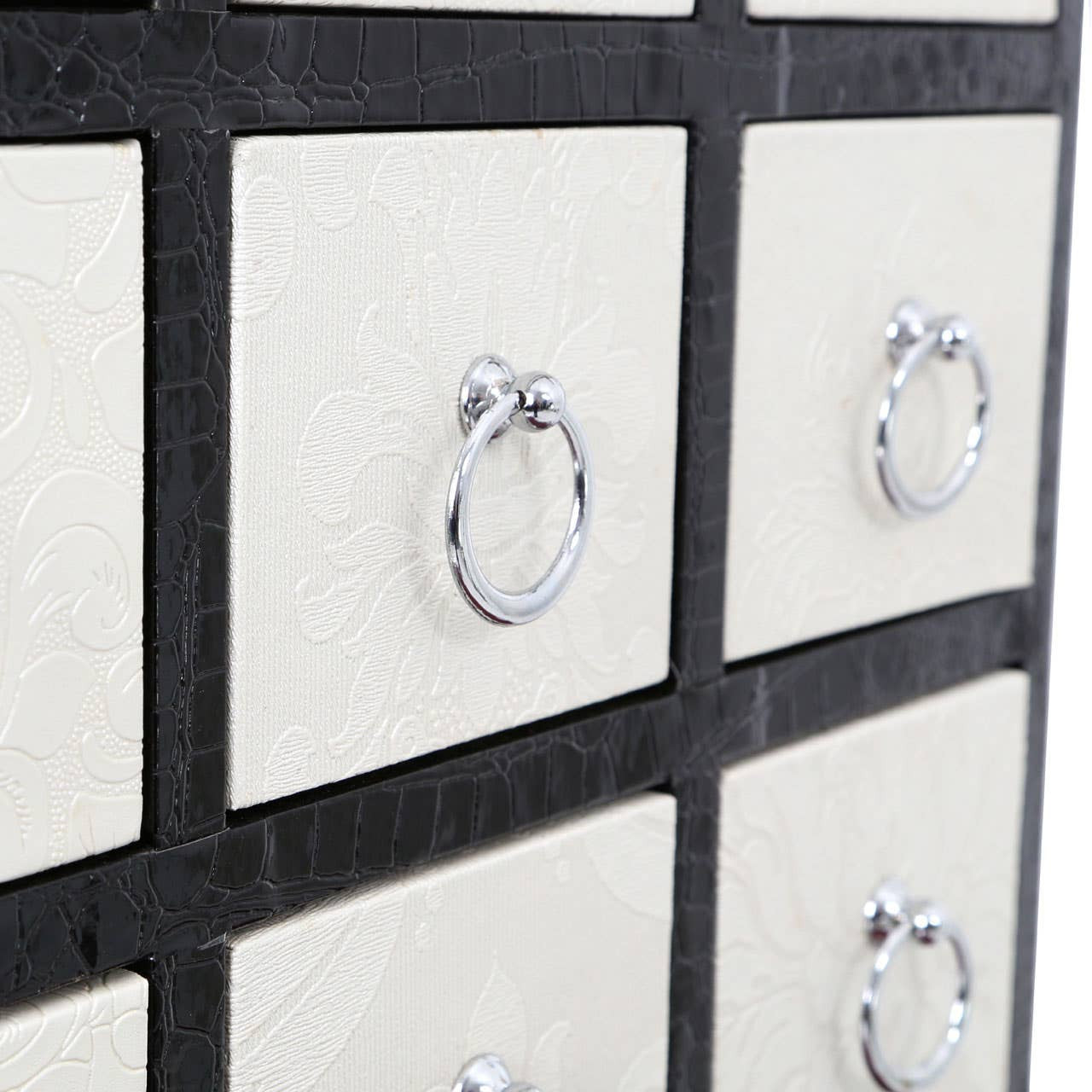 Rectangular cabinet featuring nine drawers with a crocodile leather effect finish, accented by chrome ring handles. The cabinet has a sleek design with a contrasting black border around the drawers