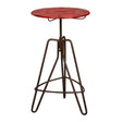 Round red metal bar table with a textured surface, supported by a sturdy brown metal base featuring a tripod design and adjustable height mechanism