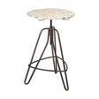Cream-colored round metal bar table with a textured surface, supported by a sleek, dark metal tripod base. The table features a height-adjustable mechanism and a minimalist design, suitable for modern home decor