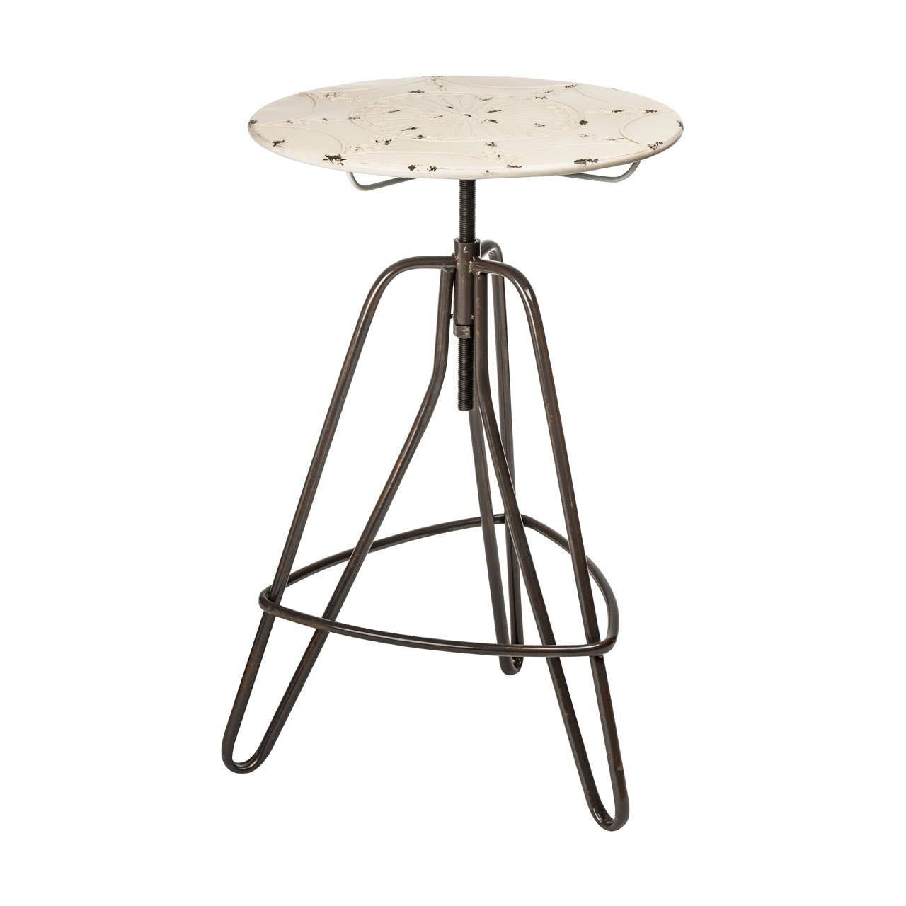 Cream-colored round metal bar table with a textured surface, supported by a sleek, dark metal tripod base. The table features a height-adjustable mechanism and a minimalist design, suitable for modern home decor